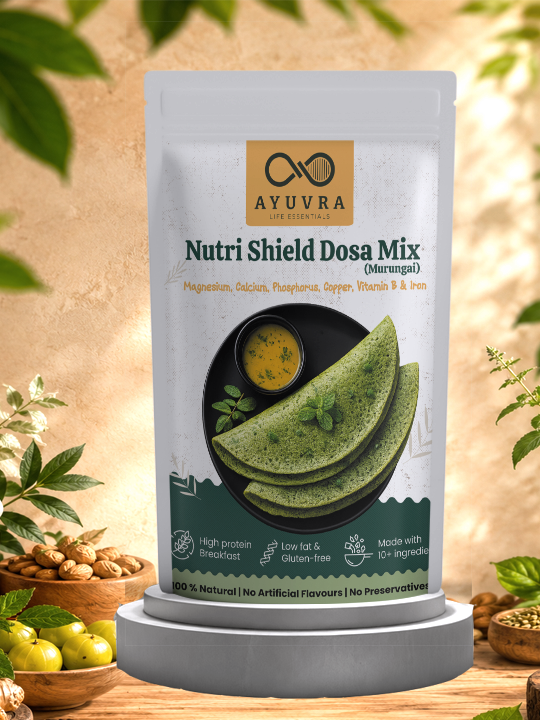 Ayuvra Nutri Shield Dosa Mix packaging with green dosa slices on a wooden background