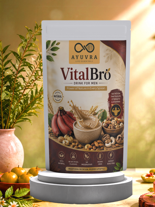 Ayuvra VitalBro drink for men packaging on a decorative stand with plants and fruits in the background